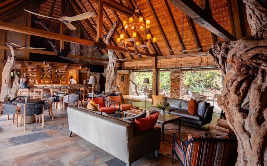 Kapama River Lodge River Bar lounge and fireplace